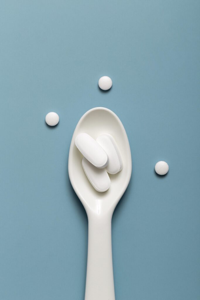 flat-lay-pills-spoon